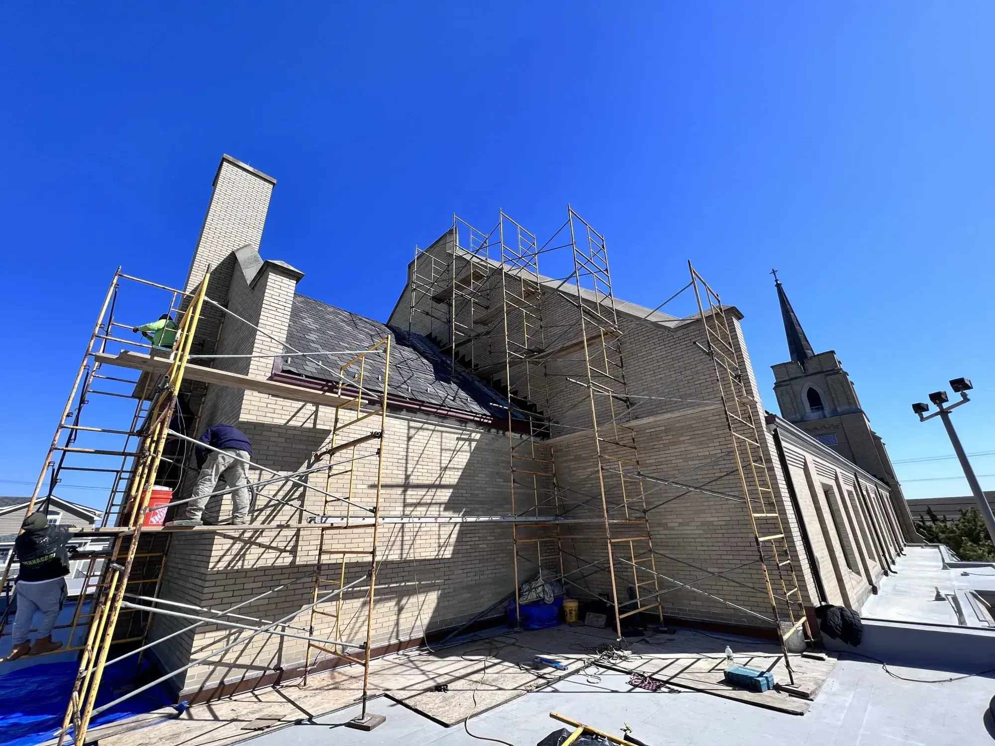 Structural masonry restoration work strengthening historic church foundations and walls