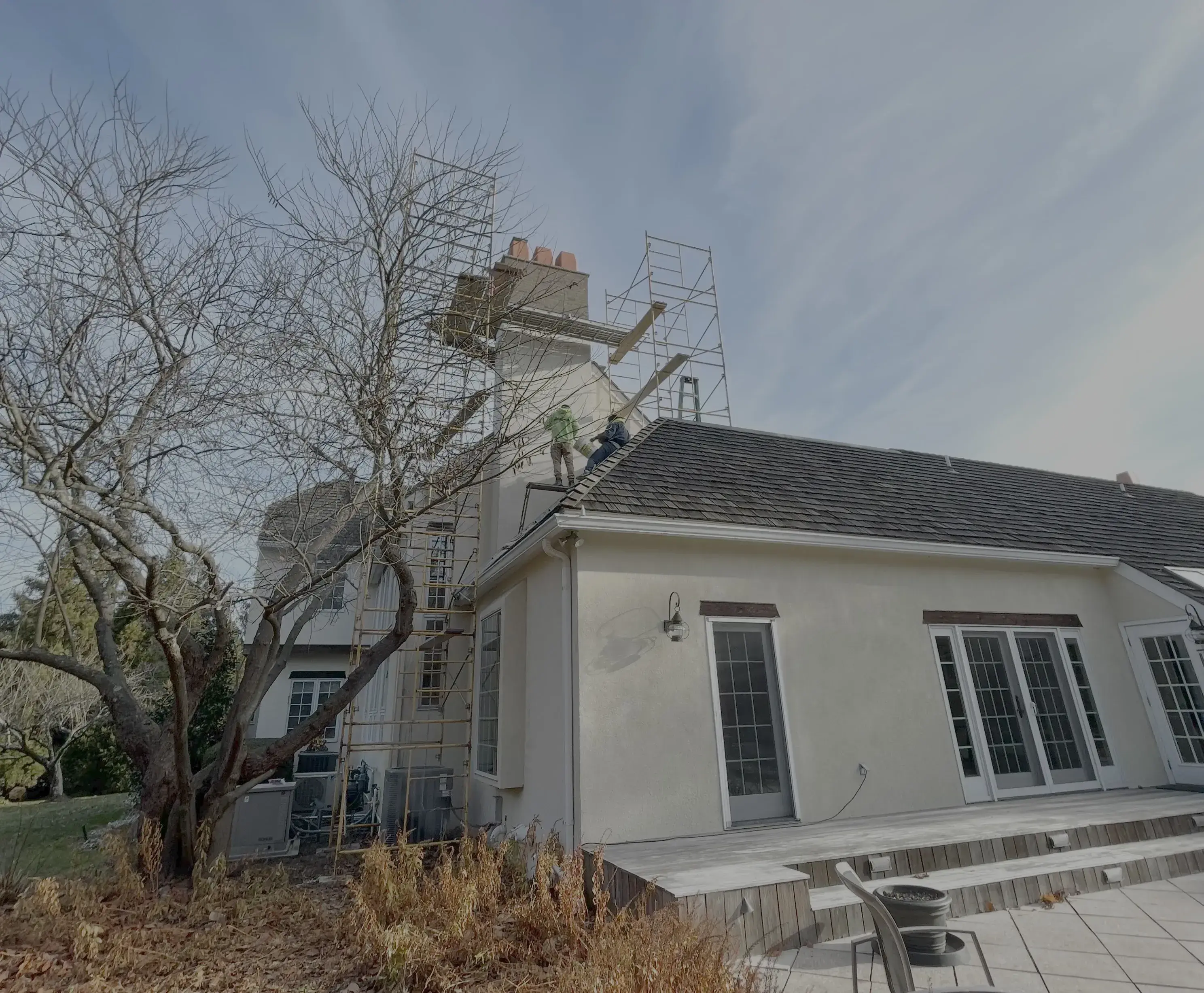 Elastomeric coating on residential exterior